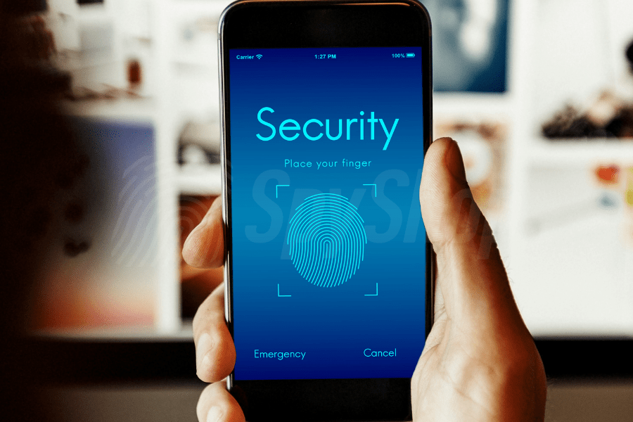 Phone in hand, screen shows fingerprint symbol and the word ‘security’