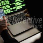 A forensic specialist analyzes digital data on a smartphone and laptop, showcasing advanced data recovery and cybersecurity investigation techniques.