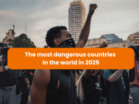 A protester raising a fist during a demonstration, symbolizing unrest, with a caption highlighting the most dangerous countries in 2025